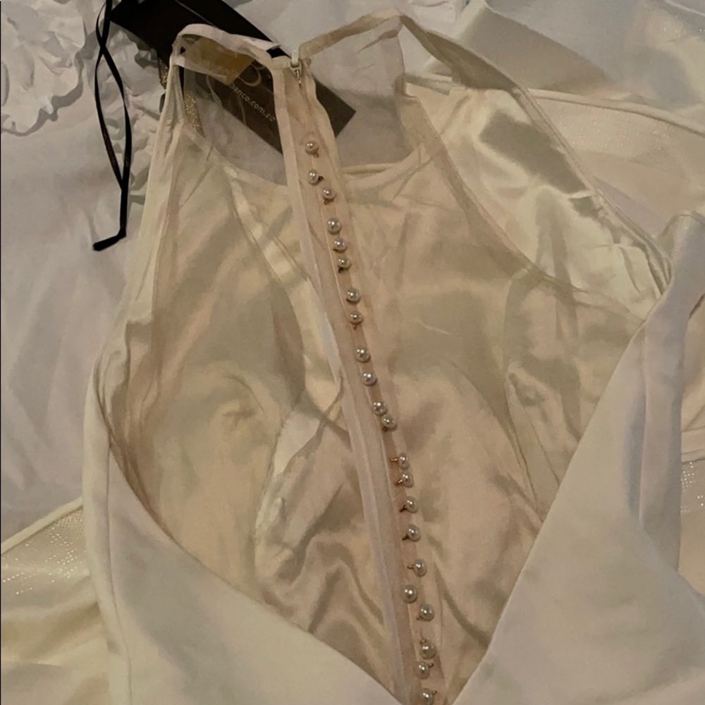 Paros Gown in White
Bronx and Banco
US 4 - Picture 12 of 12